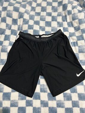 Nike Men’s Black Athletic Shorts with White Swoosh